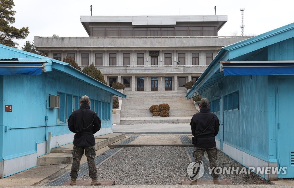 In this file photo, soldiers stand on the southern side of the Joint Security Area, also known as Panmunjom, on March 3, 2023. (Yonhap)