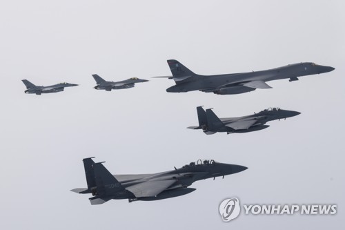 The air forces of South Korea and the United States carry out a joint drill over the West Sea and the central inland region on March 3, 2023, in this file photo provided by Seoul's defense ministry. The exercise involved F-15K and KF-16 fighter jets from South Korea and a B-1B strategic bomber from the U.S. (PHOTO NOT FOR SALE) (Yonhap)