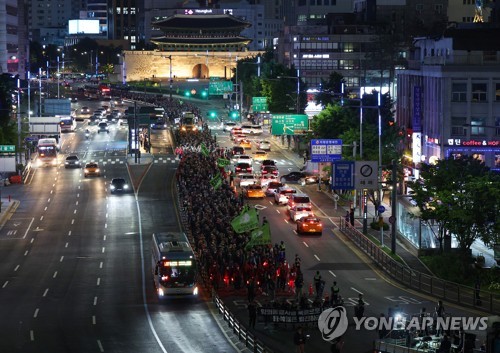 Construction workers' union chief, 4 union officials summoned for probe over overnight street rally