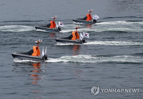 Navy's landing drill with manned, unmanned systems