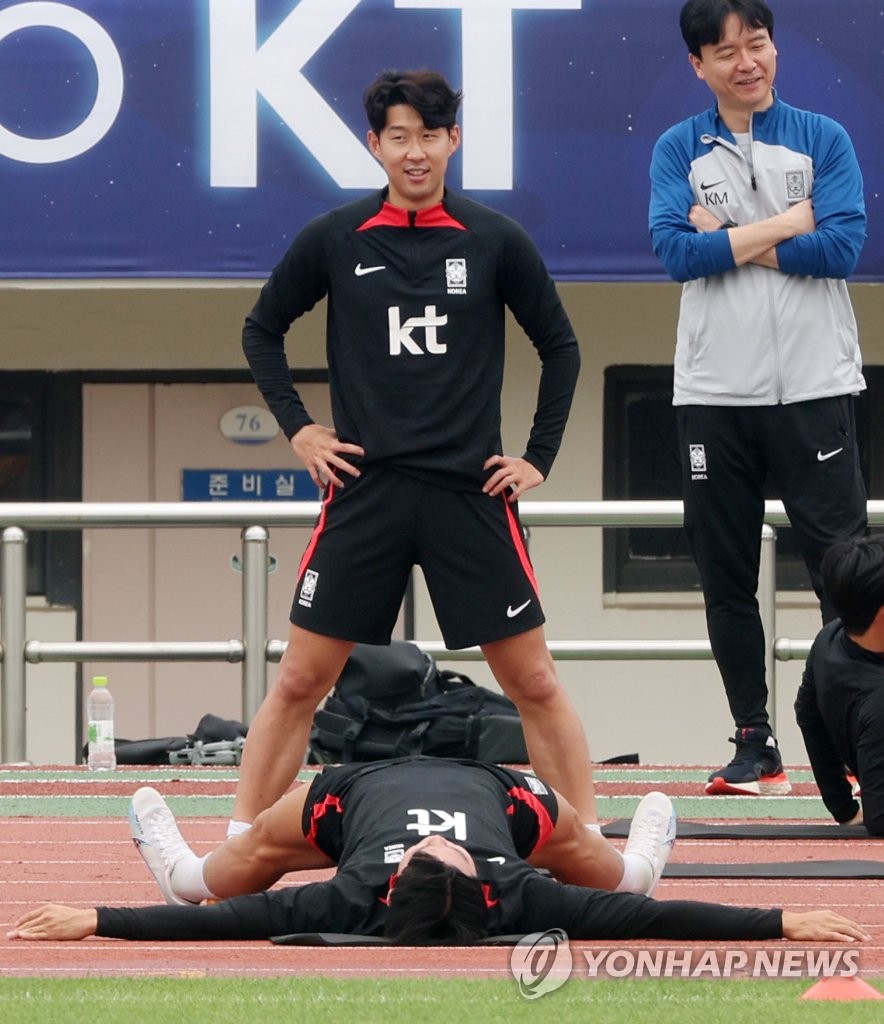 Son Heung-min, captain of the South Korean men's national football team, stretches before a training session at Gudeok Stadium in Busan, 325 kilometers southeast of Seoul, on June 14, 2023. (Yonhap)