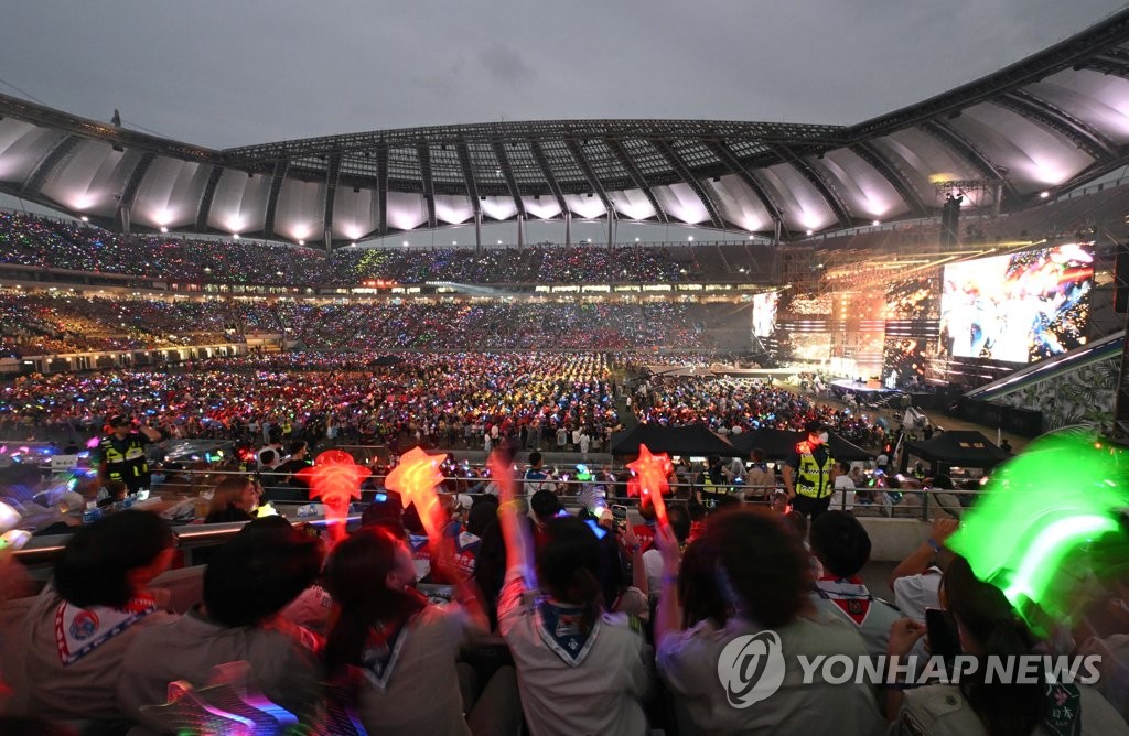 Seoul World Cup Stadium in the South Korean capital is filled with attendees of the 25th World Scout Jamboree on Aug. 11, 2023, enjoying a K-pop concert. (Pool photo) (Yonhap)