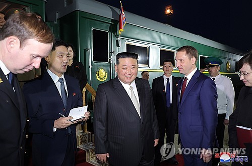 This photo, carried by North Korea's official Korean Central News Agency on Sept. 13, 2023, shows the North's leader Kim Jong-un arriving at a railway station at the Russian border city of Khasan the previous day. (For Use Only in the Republic of Korea. No Redistribution) (Yonhap)