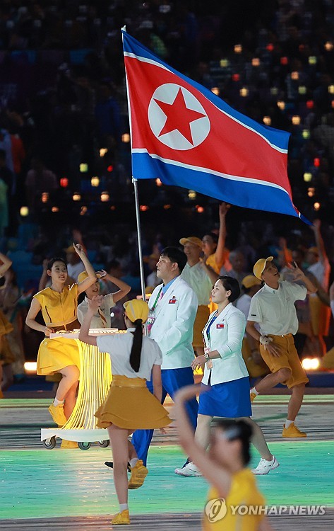 North Korea appears to be cracking open its sealed border with dispatch of  sports delegation