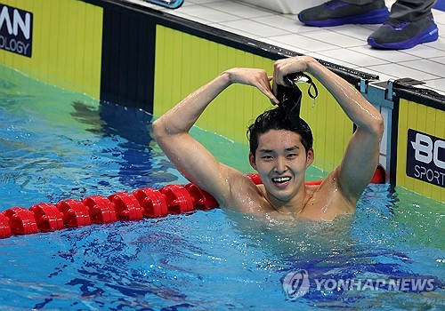  Swimmer Kim Woo-min captures 3rd gold in Hangzhou