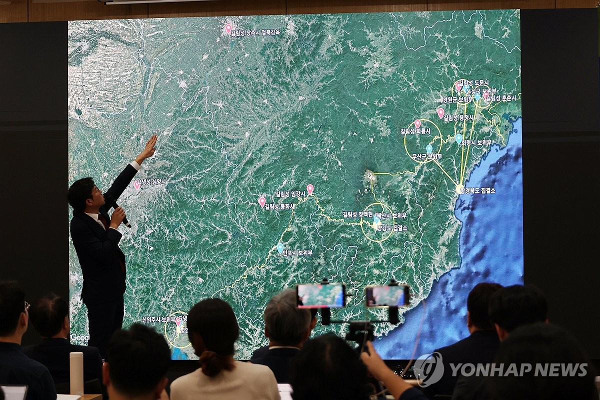 This photo, taken on Oct. 24, 2023, shows a human rights activist holding a press conference in Seoul to explain the route on which North Korean defectors are repatriated by China to their home country. (Yonhap)