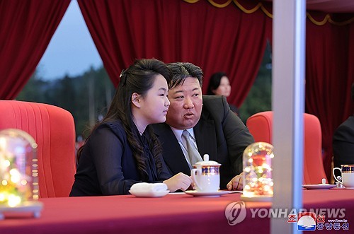 N. Korea's Kim and his daughter at street completion ceremony