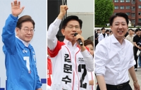 (LEAD) DP's Lee, PPP's Kim vie for votes in crucial battleground for 2nd day
